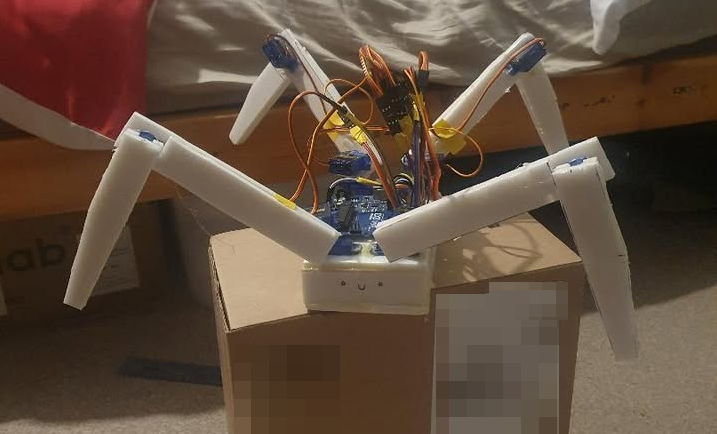 First miniature quadruped robot prototype